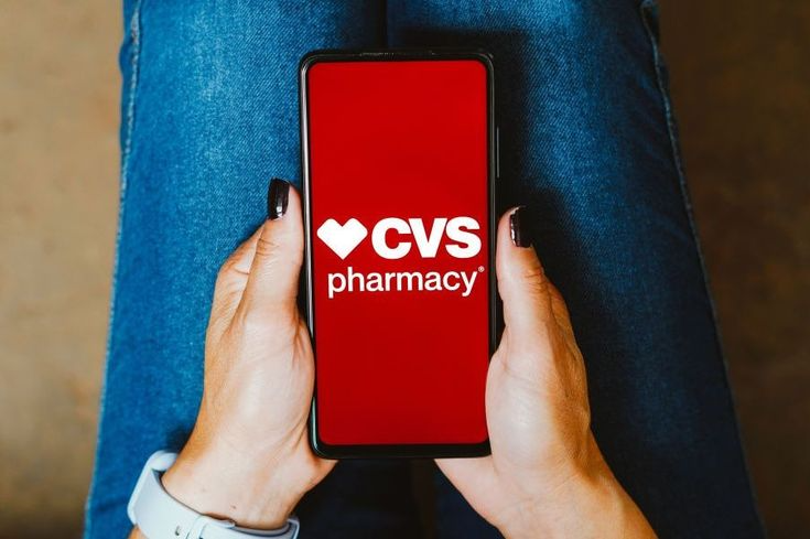 A person trying to use a CVS Pharmacy gift card for online shopping